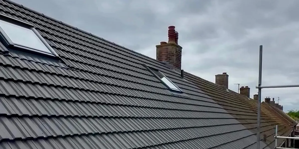 A newly tiled pitched roof with new rooflights, completed in Dundee