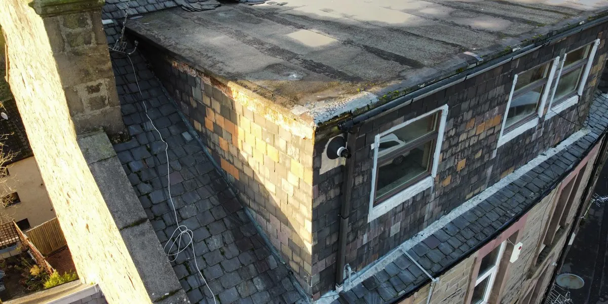 Drone survey view of a slate roof and flat roof on a Dundee property